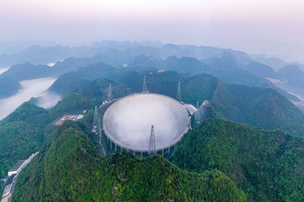 Aerial photo taken on March 31, 2021 shows China's Five-hundred-meter Aperture Spherical Radio Telescope FAST under maintenance in southwest China's Guizhou Province.