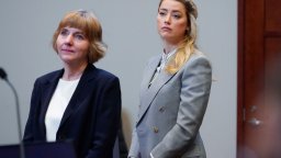 Actor Amber Heard stands with her attorney attorney Elaine Bredehoft before closing arguments in the Depp v. Heard trial at the Fairfax County Circuit Courthouse in Fairfax, Virginia, on May 27, 2022.