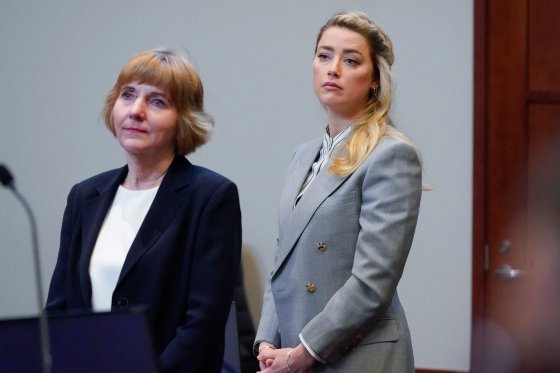 Actor Amber Heard stands with her attorney attorney Elaine Bredehoft before closing arguments in the Depp v. Heard trial at the Fairfax County Circuit Courthouse in Fairfax, Virginia, on May 27, 2022.
