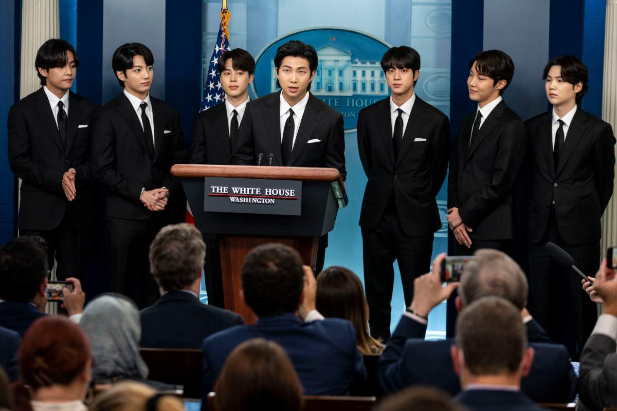 Members of the South Korean pop group BTS or Bantam Boys, (L to R) V (Kim Taehyung), JK (Jeon Jungkook), Jimin (Park Ji-min), RM Rap Monster (Kim Namjoon), Jin (Kim Seok-jin), J-Hope (Jung Ho-seok) and Suga (Min Yoongi) speak at the daily press briefing at the White House, on Tuesday, May 31, 2022 in Washington, DC. BTS met with U.S. President Joe Biden to discuss Asian inclusion and representation, and to discuss the recent rise in anti-Asian hate crimes.