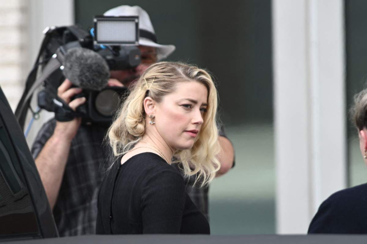 Amber Heard arrives to hear the verdict in the Depp v. Heard trial at the Fairfax County Circuit Courthouse in Fairfax, Virginia, on June 1, 2022.
