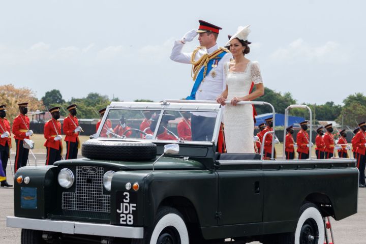 Catherine, Duchess of Cambridge and Prince William, Duke of Cambridge ride in a Land Rover as they attend the inaugural Commissioning Parade for service personnel from across the Caribbean with Prince William, Duke of Cambridge, at the Jamaica Defence Force on day six of the Platinum Jubilee Royal Tour of the Caribbean on March 24, 2022 in Kingston, Jamaica.
