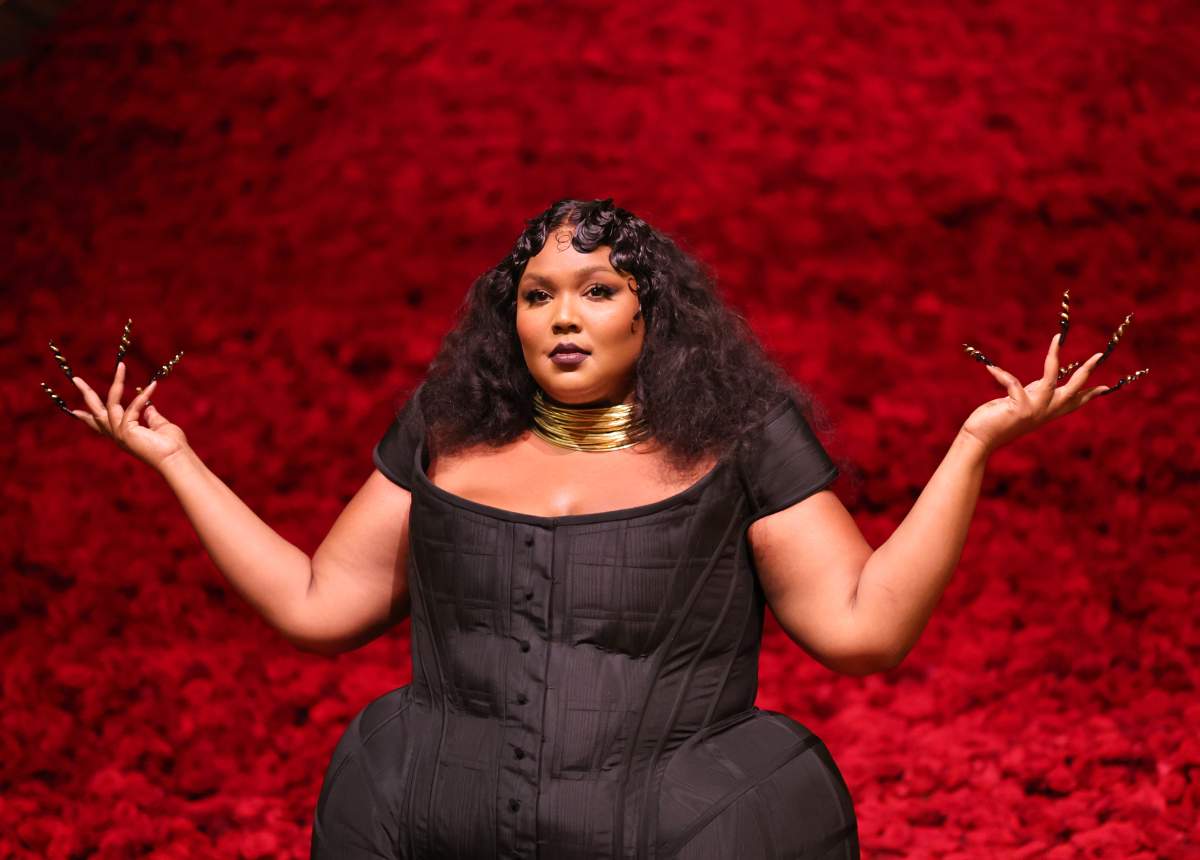 Lizzo, wearing a black dress and gold necklace, attends The 2022 Met Gala Celebrating "In America: An Anthology of Fashion" at The Metropolitan Museum of Art on May 02, 2022 in New York City.