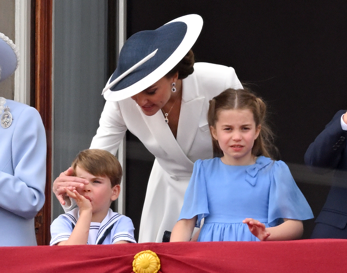 Prince Louis, Catherine, Duchess of Cambridge and Princess Charlotte during Trooping the Colour on June 02, 2022 in London, England.