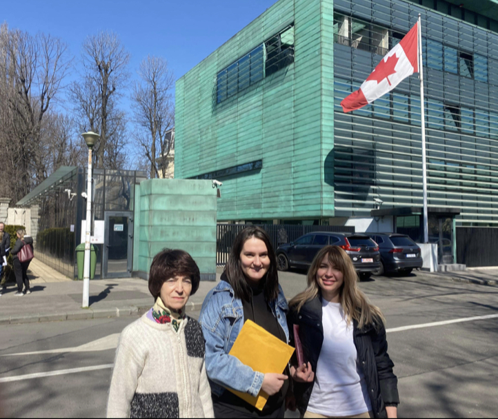 From left, Nina Huzanova, Svitlana Cherepanova and Lidiia Sazhko outside the Canadian Embassy in Ukraine.