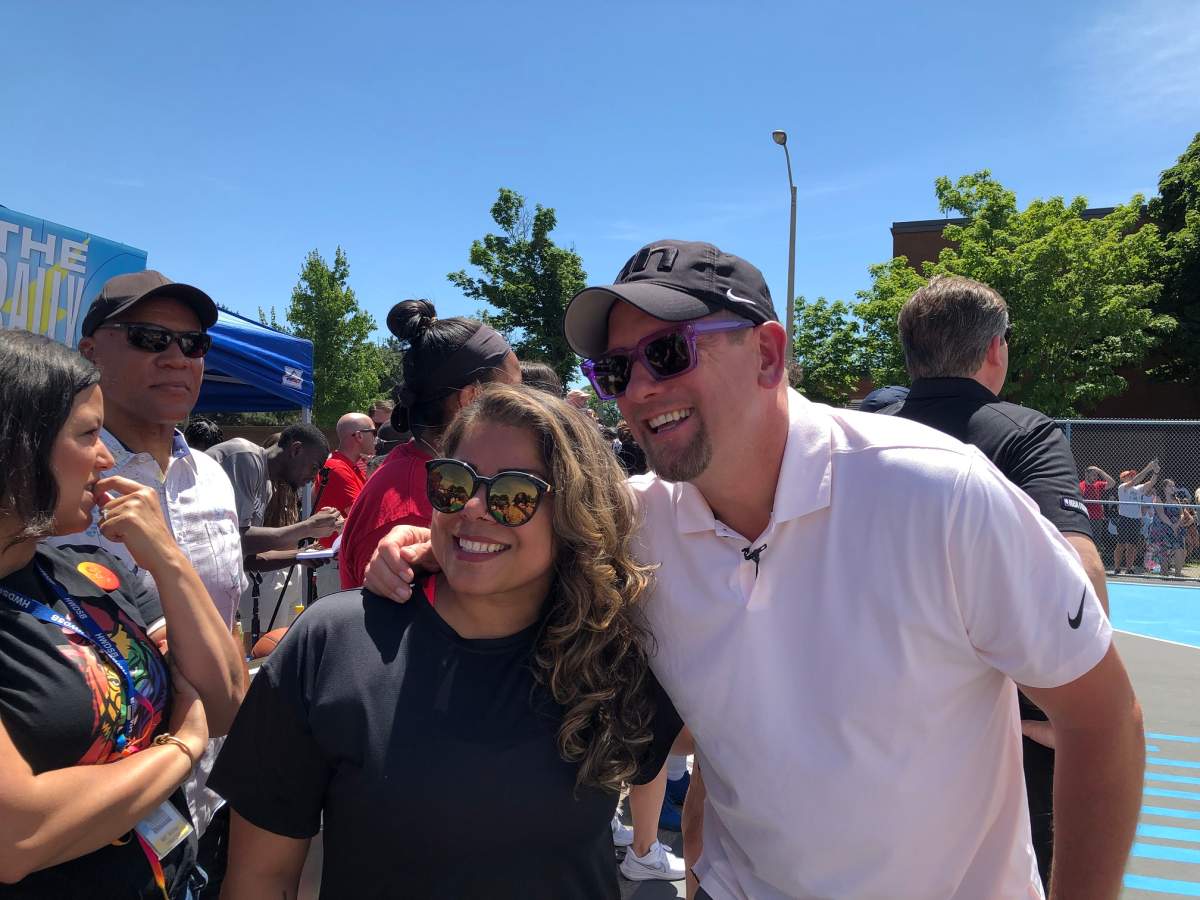 Nrinder Nann poses with Nick Nurse.