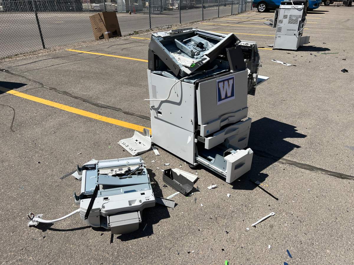 The aftermath of a destroyed copy machine at the “Rage for Carmichael” fundraiser.