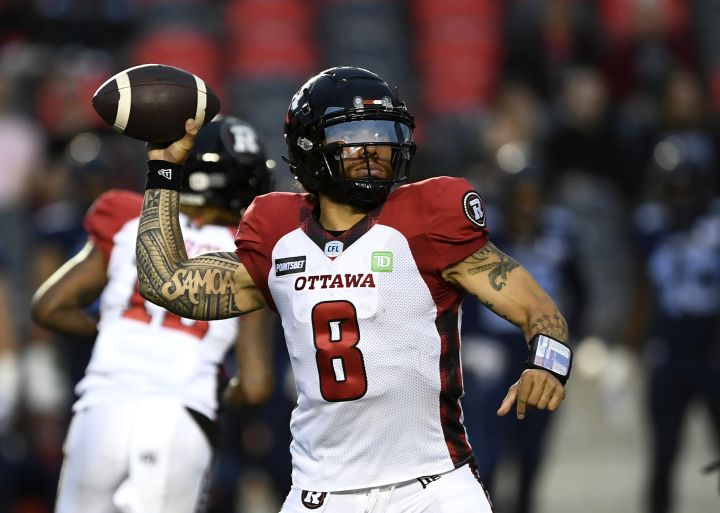 Ottawa Redblacks quarterback Jeremiah Masoli (8) throws the ball during first half of preseason CFL football action against the Toronto Argonauts in Ottawa on Friday, May 27, 2022.