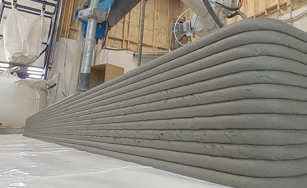 Twente Additive Manufacturing’s six-axis robotic arm is the centerpiece of their 3D concrete printing system. It can be programmed to move in precise, predetermined patterns, in order to build walls and other 3D structures one layer of concrete at a time.