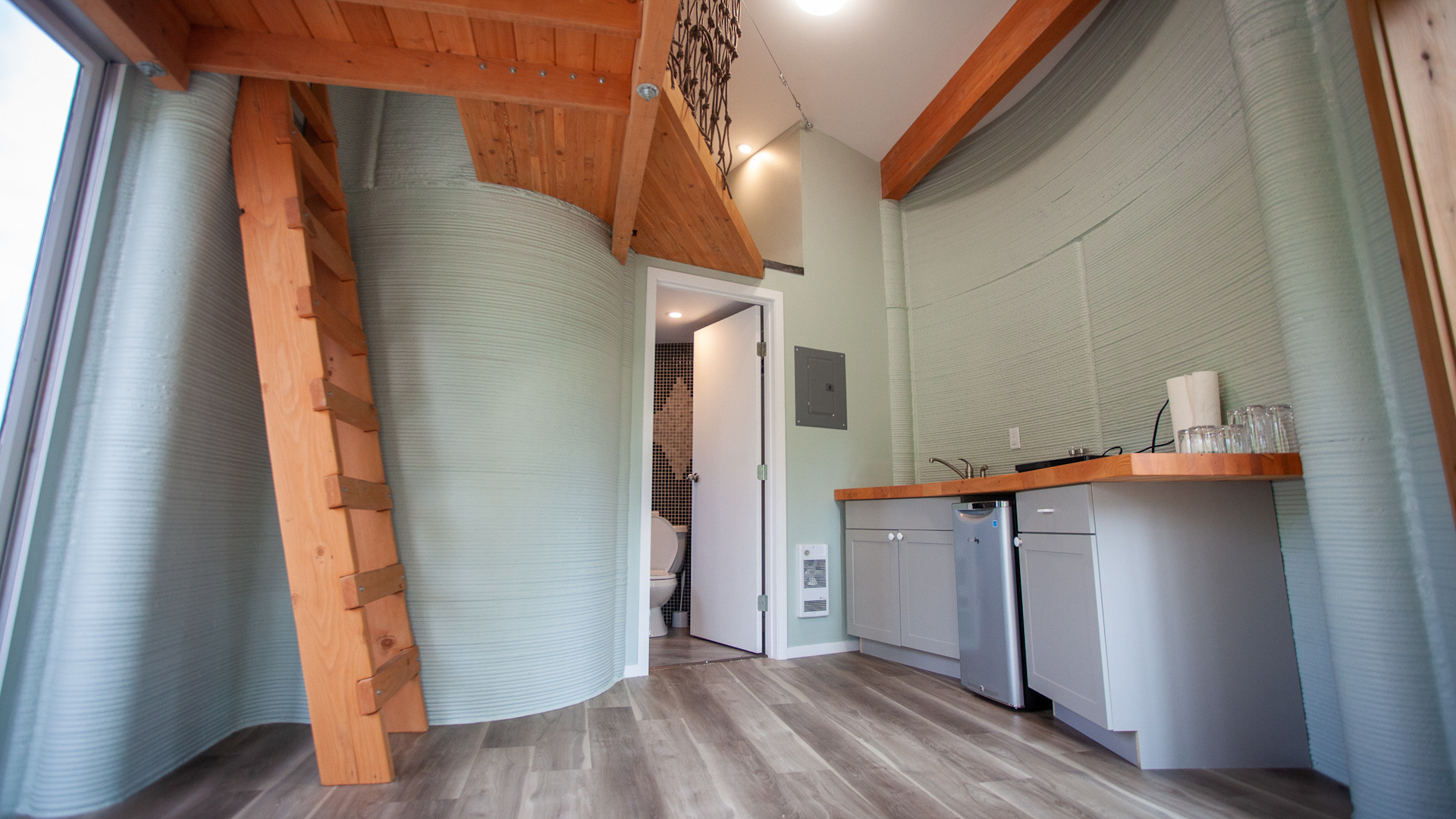 A view inside the Fibonacci House showing the exposed, printed concrete interior walls. The ability to leave the walls ‘unfinished’ is another selling feature of this technology, as the installation of traditional wall coverings like drywall can be a major investment of both time and money during construction.