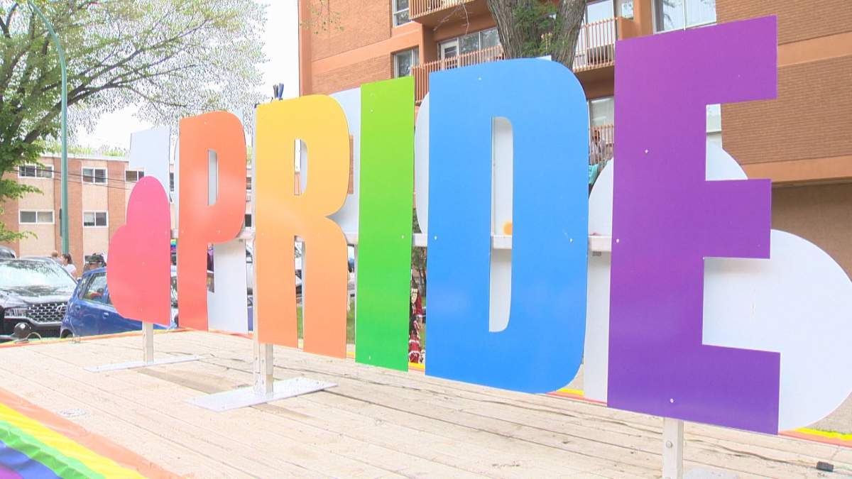 2022 Regina Pride parade marching on the city streets to the legislature