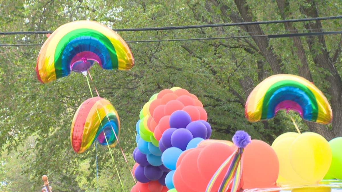 2022 Regina Pride parade marching on the city streets to the legislature