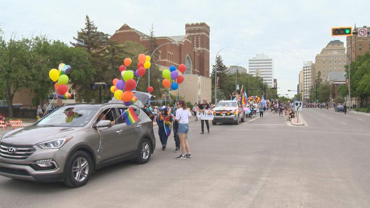 2022 Regina Pride parade marching on the city streets to the legislature