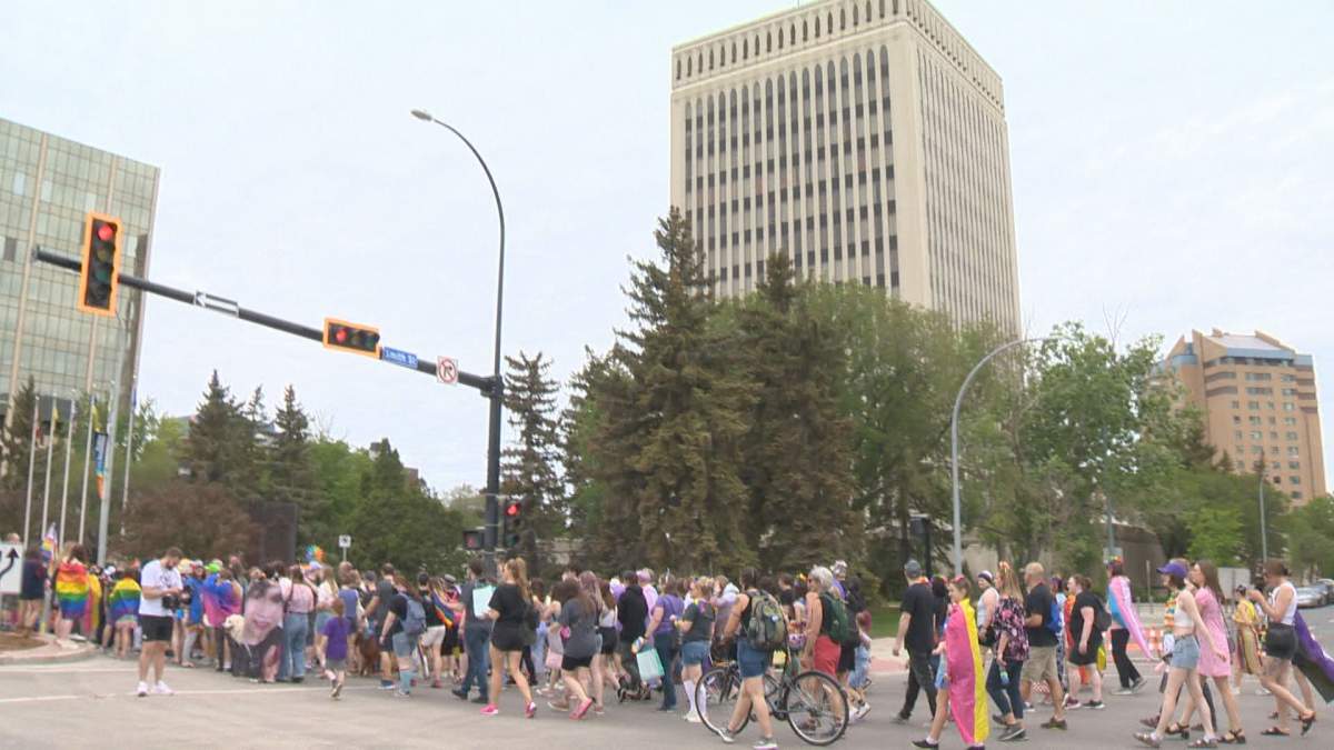 2022 Regina Pride parade marching on the city streets to the legislature