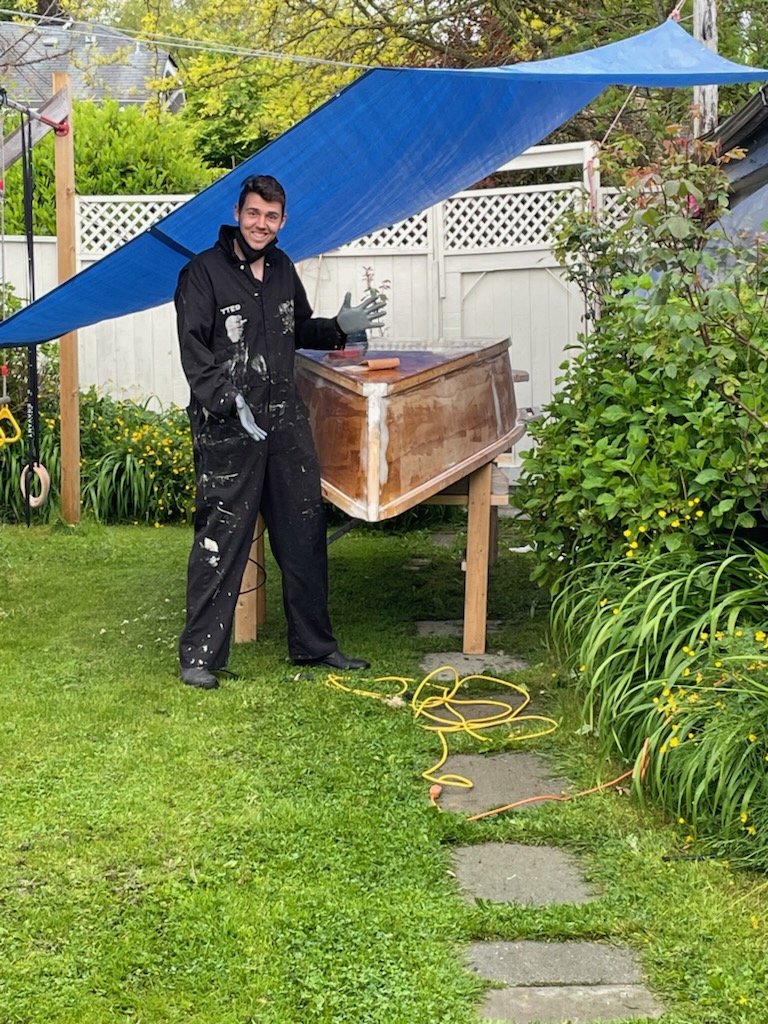 Duncan McDonald of Vancouver works on his homemade sailboat, named 'Saller Doodad' by his kids. The vessel was stolen just hours after its completion overnight on Thurs. June 17, 2022.