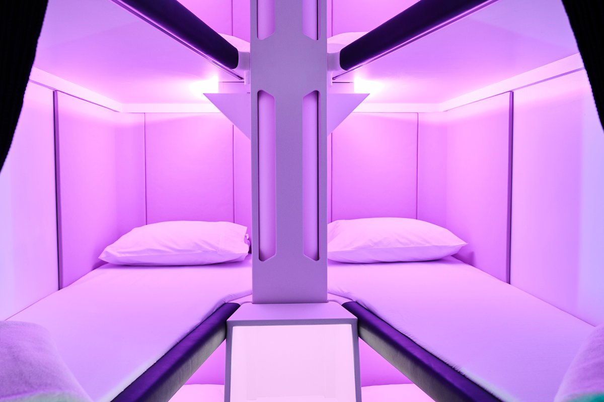 Promotional image of Air New Zealand's Skynest, a group of sleeping pods that will be offered to economy class passengers on long-haul flights.