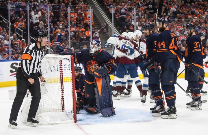 Colorado Avalanche celebrate a goal as Edmonton Oilers goalie Mike Smith (41) looks to the ref during third period NHL conference finals action in Edmonton on Monday, June 6, 2022.