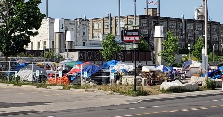 Waterloo Region beefs up security, provides porta-potties for homeless encampment in Kitchener