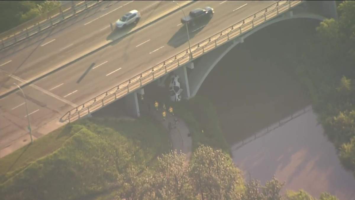 An upside down car under the Campbell bridge on June 16, 2022.