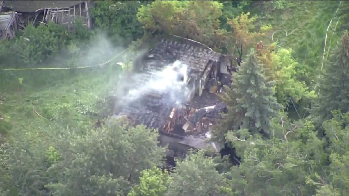 Strathcona County fire crews work to put out a fire at an abandoned building on June 28, 2022.