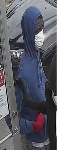 A suspects is seen on CCTV footage in an undated photo. Calgary police believe a pair of suspects are responsible for a string of pharmacy robberies from June 14 to 16, 2022.