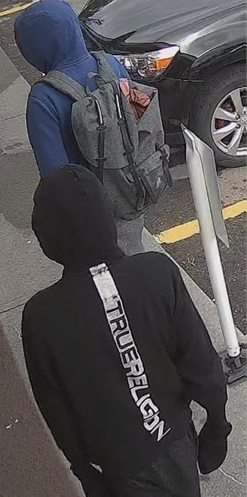 Suspects are seen on CCTV footage in an undated photo. Calgary police believe a pair of suspects are responsible for a string of pharmacy robberies from June 14 to 16, 2022.