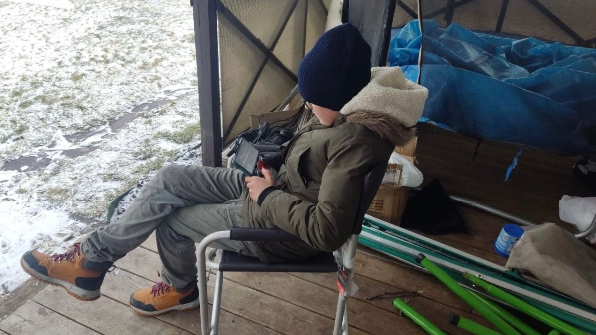 Andrii Pokrasa, 15, flying his drone near Kyiv, Ukraine.