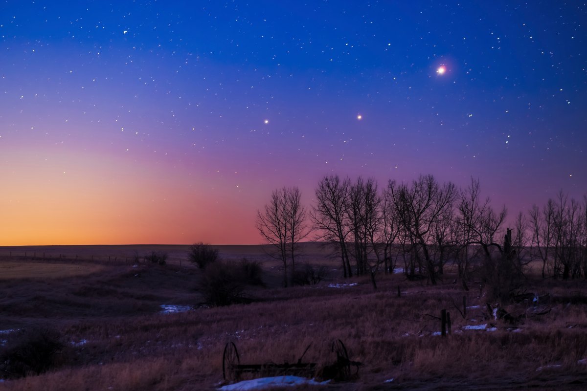 The trio of (L to R) Saturn, Mars and Jupiter in conjunction in the dawn twilight, taken from home in Alberta on March 26, 2020. 
