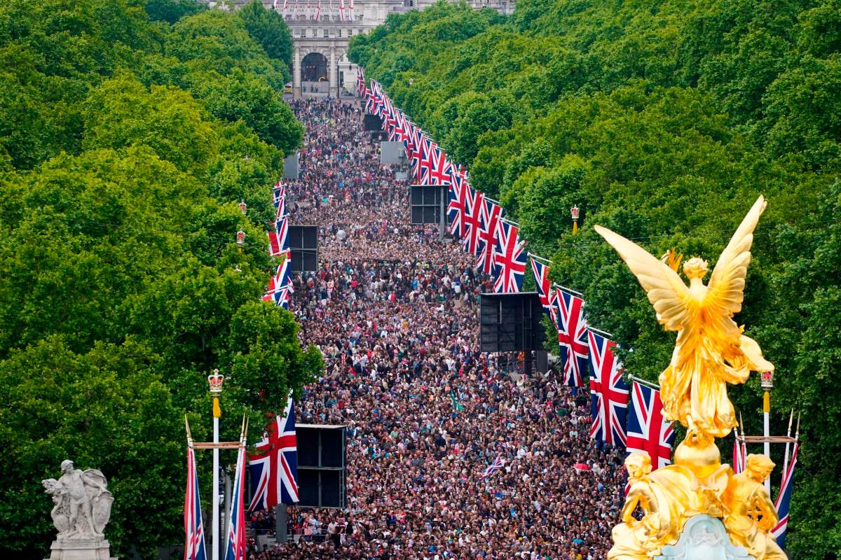 Tens of thousands gather on The Mall outside Buckingham Palace.
