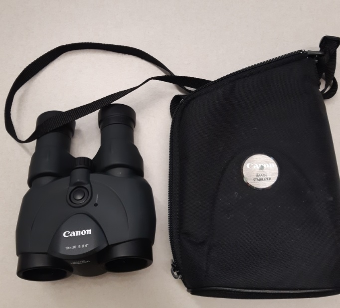 Binoculars were among the items stolen from an unmarked Calgary police vehicle in the downtown core Tuesday, June 14, 2022.