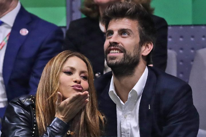 FILE - Colombian singer Shakira blows a kiss next to her husband Barcelona soccer player Gerard Pique while watching the Davis Cup final in Madrid, Spain, on Nov. 24, 2019. 