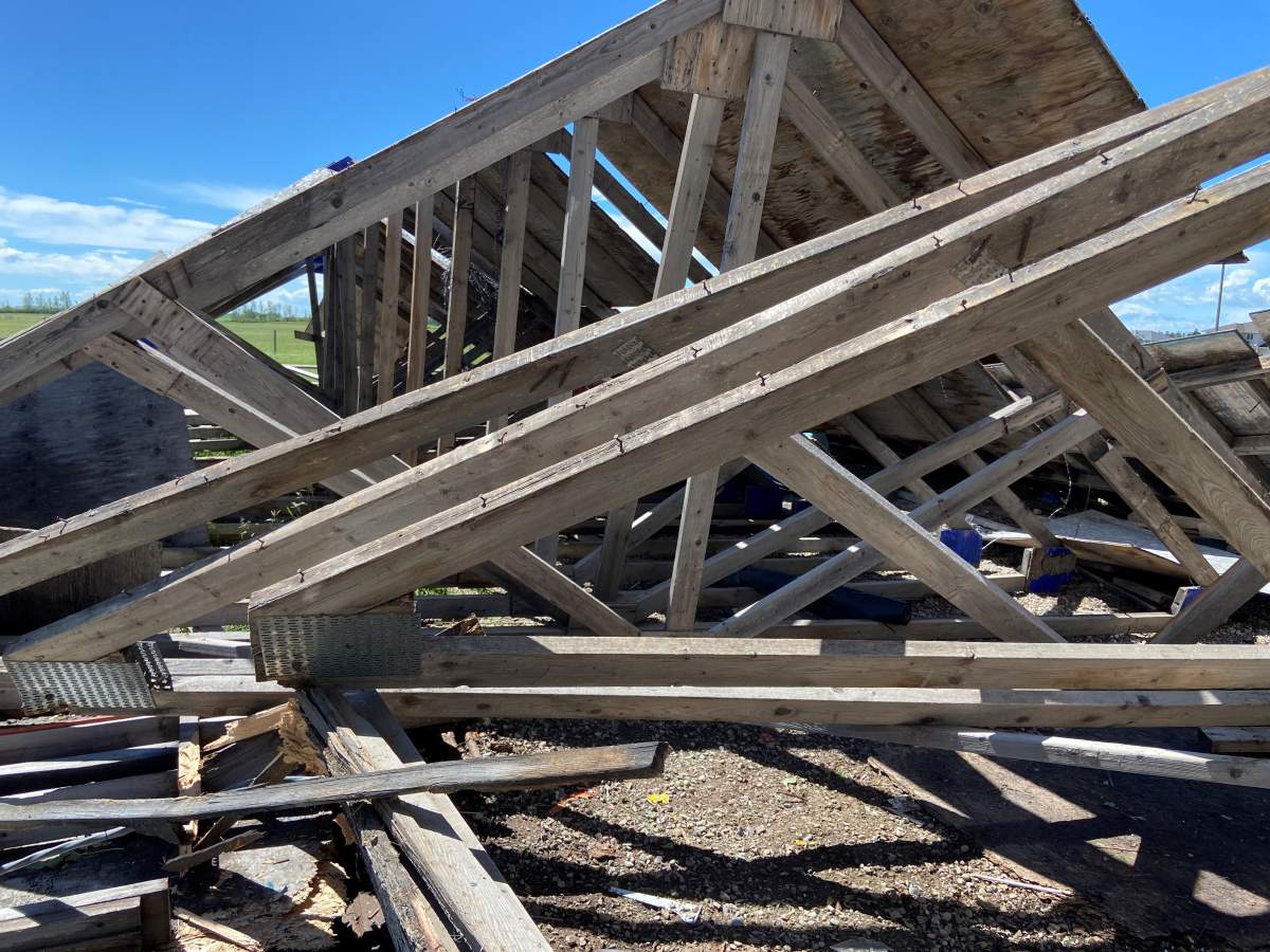 Wooden shed collapsed in storm on Langdon property.