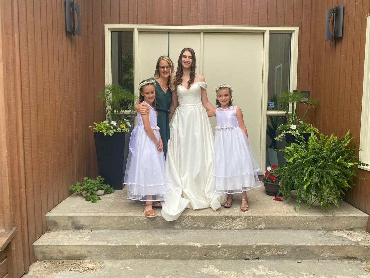 Violetta Mikho with her Canadian host family on her wedding day.
