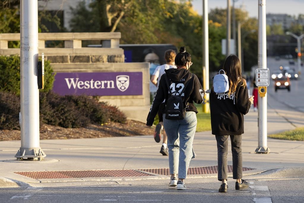 Students walk at the Western University campus in London, Ont. on Wednesday, September 15, 2021. THE CANADIAN PRESS/Nicole Osborne.