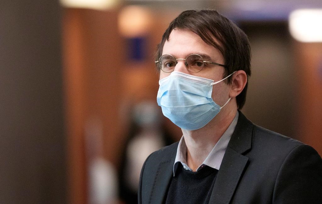 Gabriel Sohier Chaput walks the halls of the courthouse in Montreal on Monday, Feb. 28, 2022. 