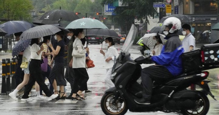 Heavy rains flood South Korea, leaving at least 7 dead and 6 missing