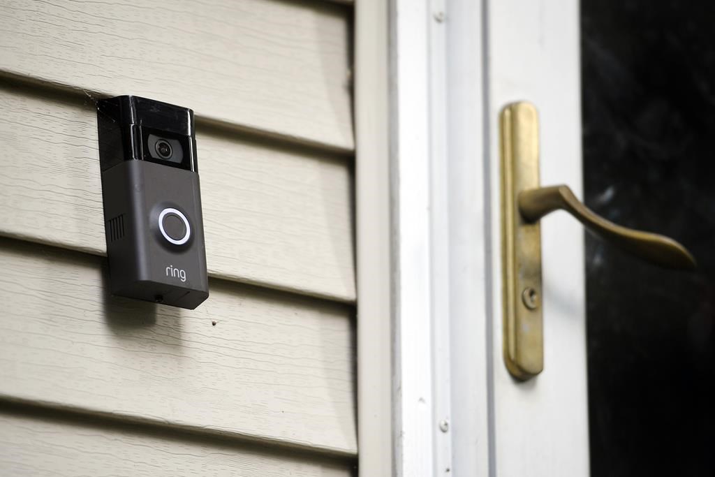 FILE - a Ring doorbell camera is seen installed outside a home in Wolcott, Conn., on July 16, 2019. 