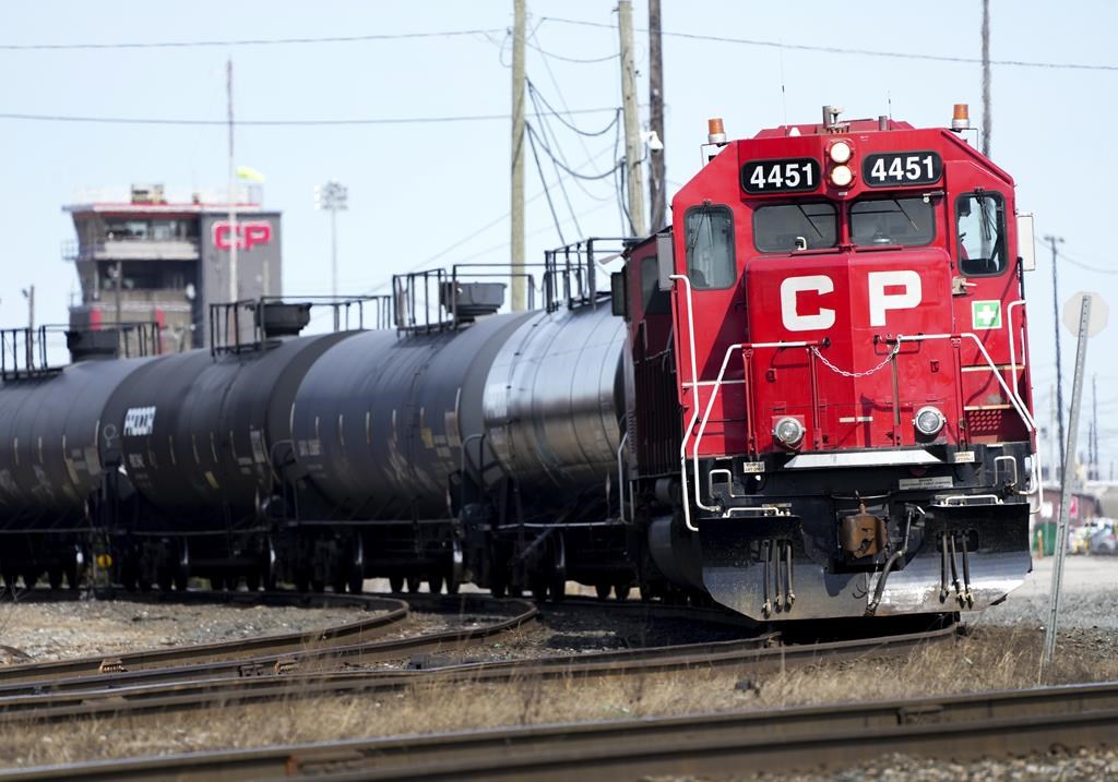 Canadian Pacific Railway trains sit idle on the train tracks due to the strike at the main CP Rail trainyard in Toronto on Monday, March 21, 2022.