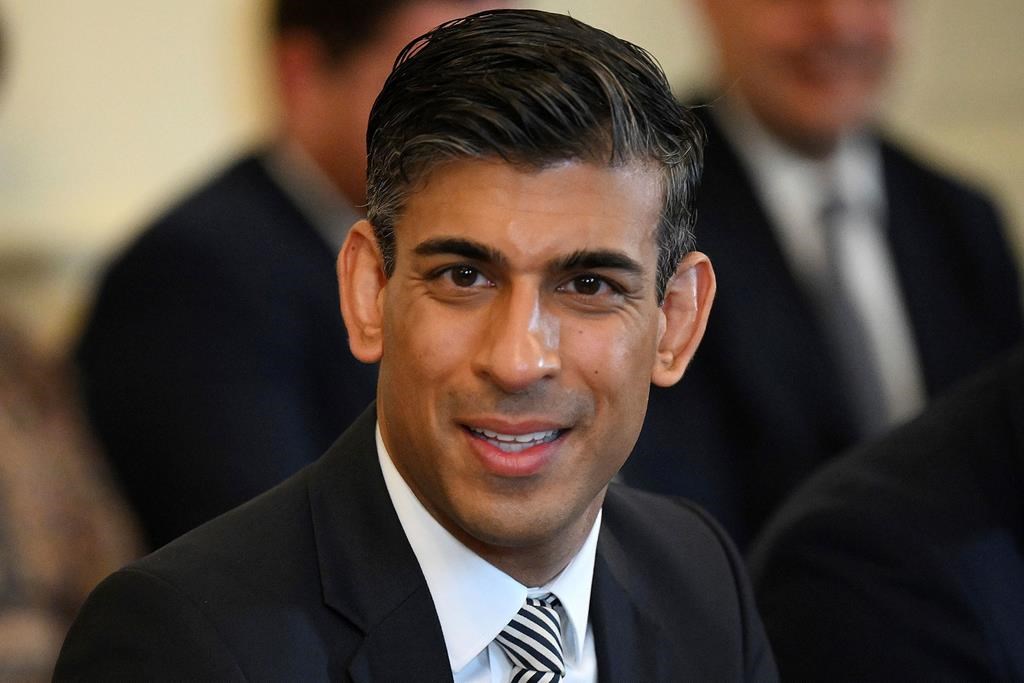 FILE – Britain’s Chancellor of the Exchequer Rishi Sunak attends a cabinet meeting at 10 Downing Street, London, May 24, 2022. Britain’s Conservative Party will choose two finalists on Wednesday, July 20, 2022, in the contest to replace Boris Johnson, as the divisive, unrepentant leader makes his final appearance in Parliament as prime minister. (Daniel Leal/Pool via AP, File)