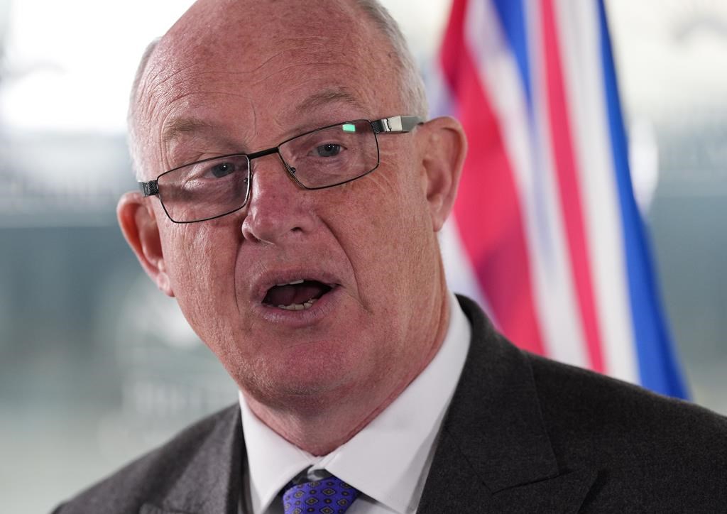 B.C. Public Safety Minister Mike Farnworth speaks during a news conference in Vancouver on April 11, 2022. Farnworth says the province is ending its arrangement with Canada Border Services Agency to hold immigration detainees in provincial correctional centres. THE CANADIAN PRESS/Darryl Dyck.