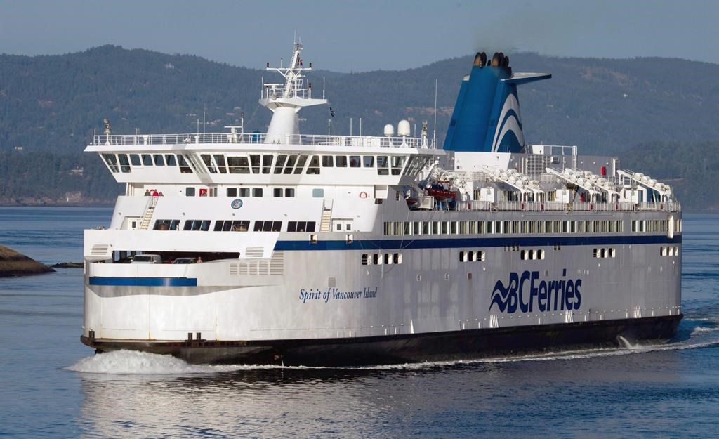 The BC Ferries vessel Spirit of Vancouver Island passes between Galiano Island and Mayne Island while travelling from Swartz Bay to Tsawwassen, B.C., on Aug. 26, 2011.