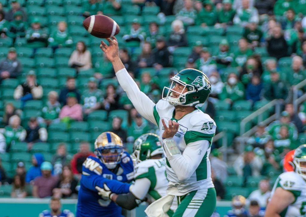 Saskatchewan Roughriders quarterback Jake Dolegala (9) throws the football against the Winnipeg Blue Bombers during the first half of preseason CFL football action at Mosaic Stadium in Regina, Sask., on Tuesday, May 31, 2022. The circumstances may be strange but Dolegala isn’t about to pass up on the opportunity to be the starting quarterback for the Saskatchewan Roughriders. THE CANADIAN PRESS/Heywood Yu.