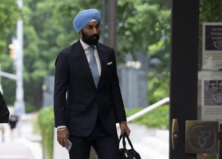 The trial for former Liberal MP Raj Grewal, who stands accused of using his political office for personal financial gain, will extend until at least this fall. Grewal makes his way to court, Monday, July 18, 2022 in Ottawa. 
