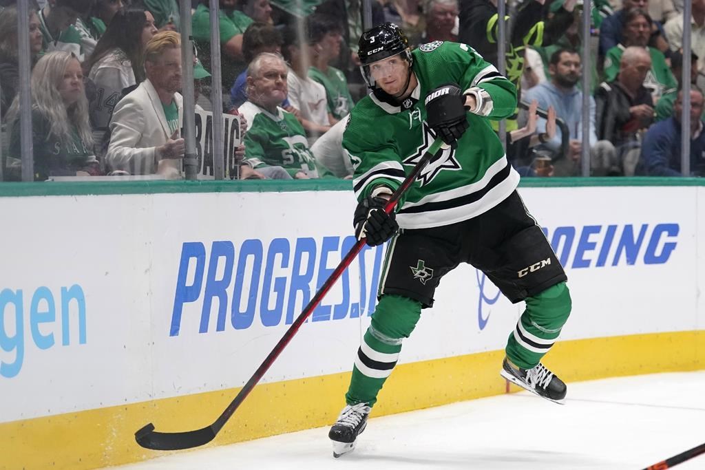 FILE - Dallas Stars defenceman John Klingberg makes a pass during an NHL hockey game against the New York Islanders, Tuesday, April 5, 2022, in Dallas.