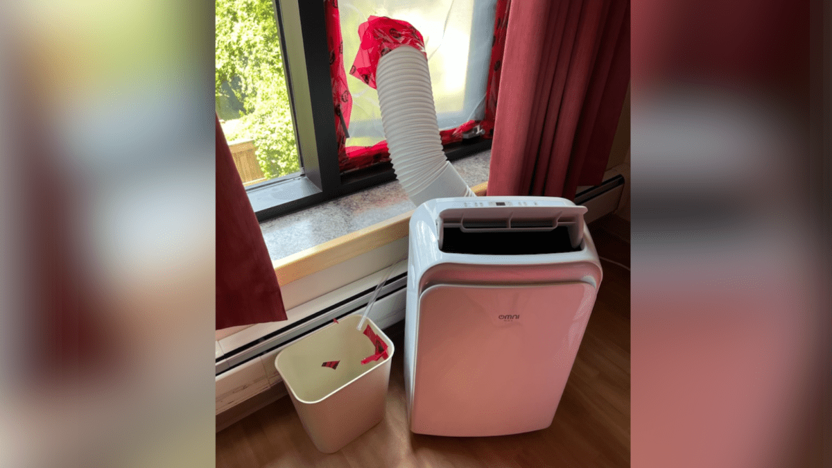 Picture of air conditioning unit placed inside a resident's unit at Royal Rose Place in Welland, Ont. on July 22, 2022 during a late July heat wave.