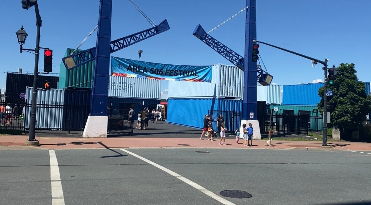 Dozens of people strolled through the container village hours before gates opened to the Area 506 Festival.
