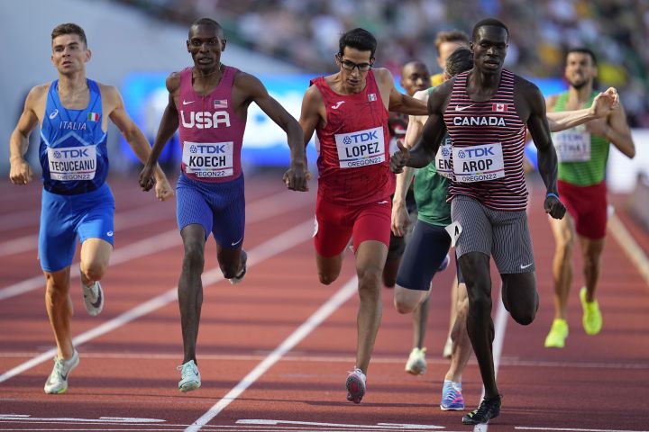 Marco Arop, of Canada, wins during a heat in the men’s 800-meter run at the World Athletics Championships on Wednesday, July 20, 2022, in Eugene, Ore.