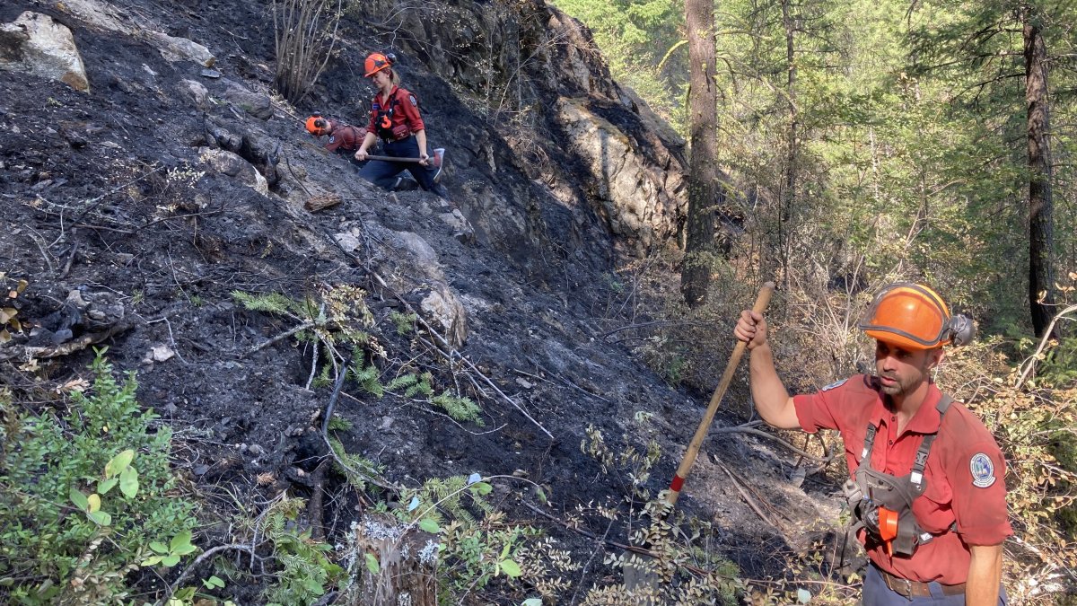 Crews from the BC Wildfire Service seen patrolling for hot spots in the Nohomin Creek blaze near Lytton, B.C., on Tuesday, July 19, 2022.