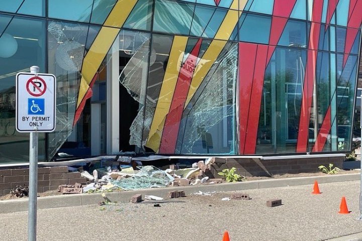 No injuries after car plows into front of Burlington Public Library