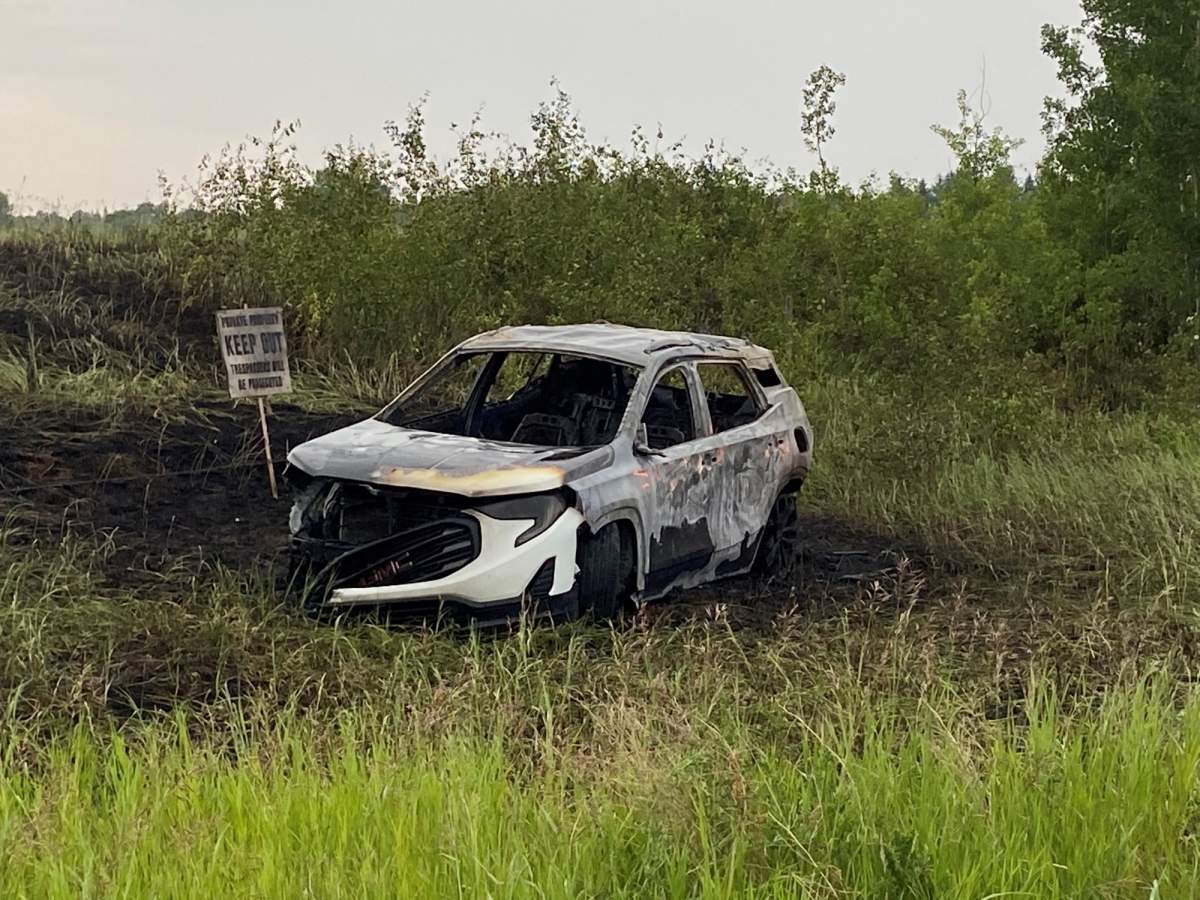 A Global News crew spotted a burned-out car in the area of 153 Avenue and 9 Street on Monday night. A police vehicle was also spotted at the scene.